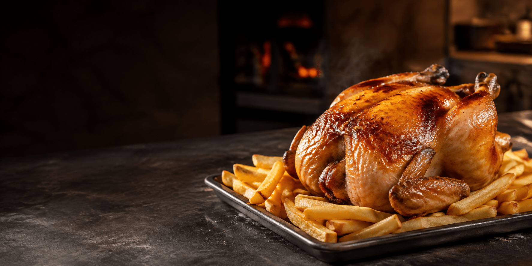 Pollo a l’Ast recién asado con patatas fritas